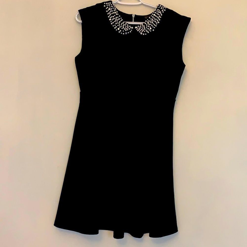 3/$30Urban hearts sleeveless black dress with faux pearl Peter Pan collar.Size L